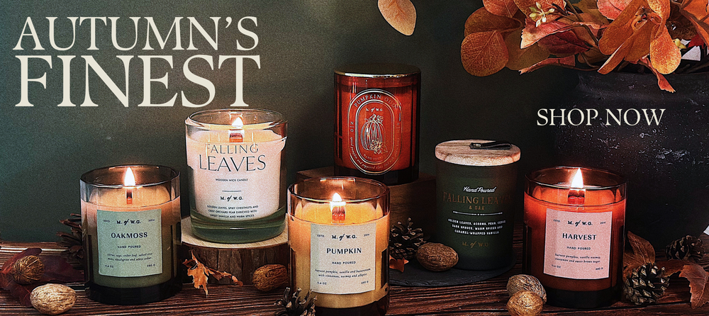 Collection of candles with autumn-themed labels on a dark background with 'Autumn's Finest' text.